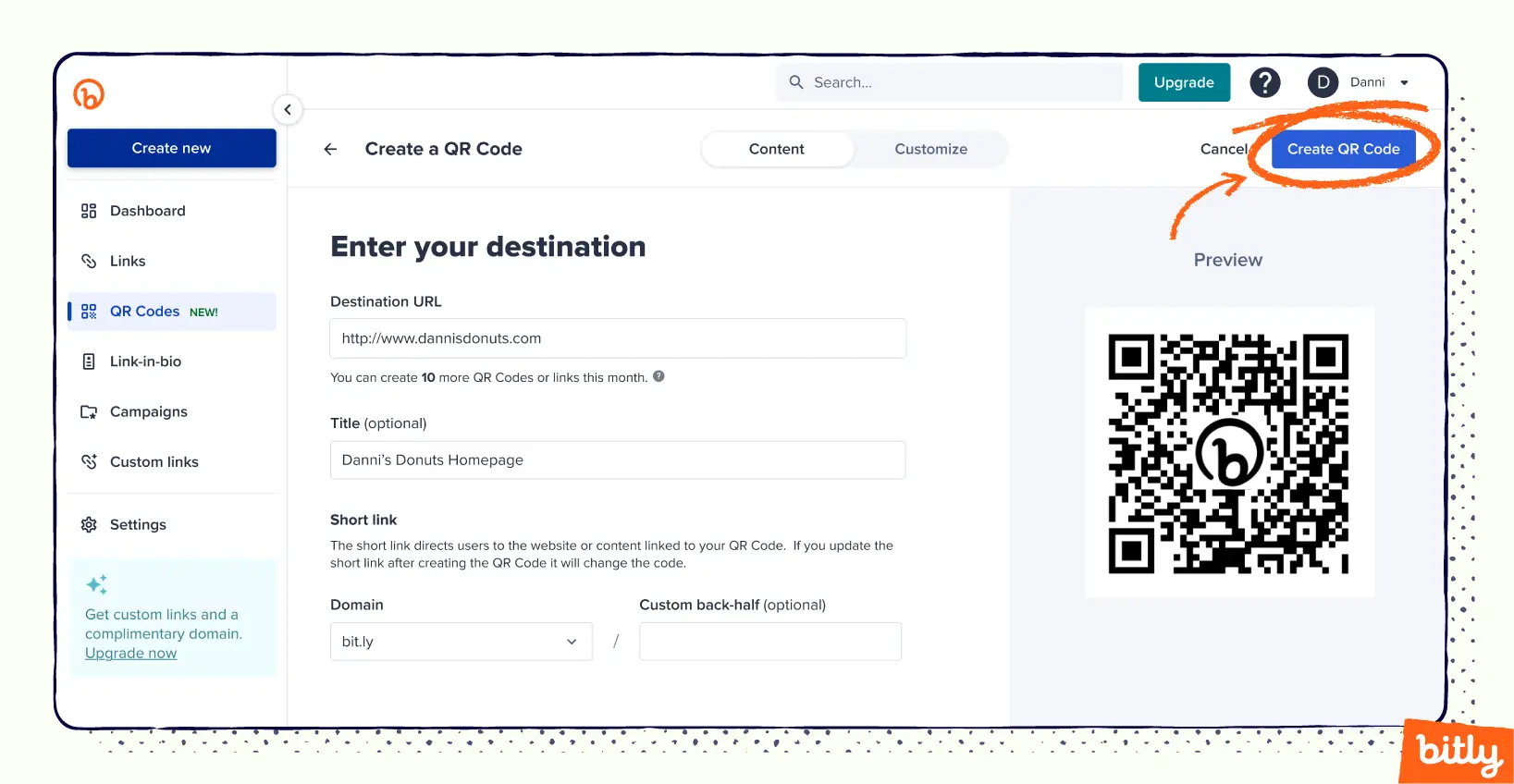 An arrow pointing to and circling around a blue “Create QR Code” button on the Bitly platform.